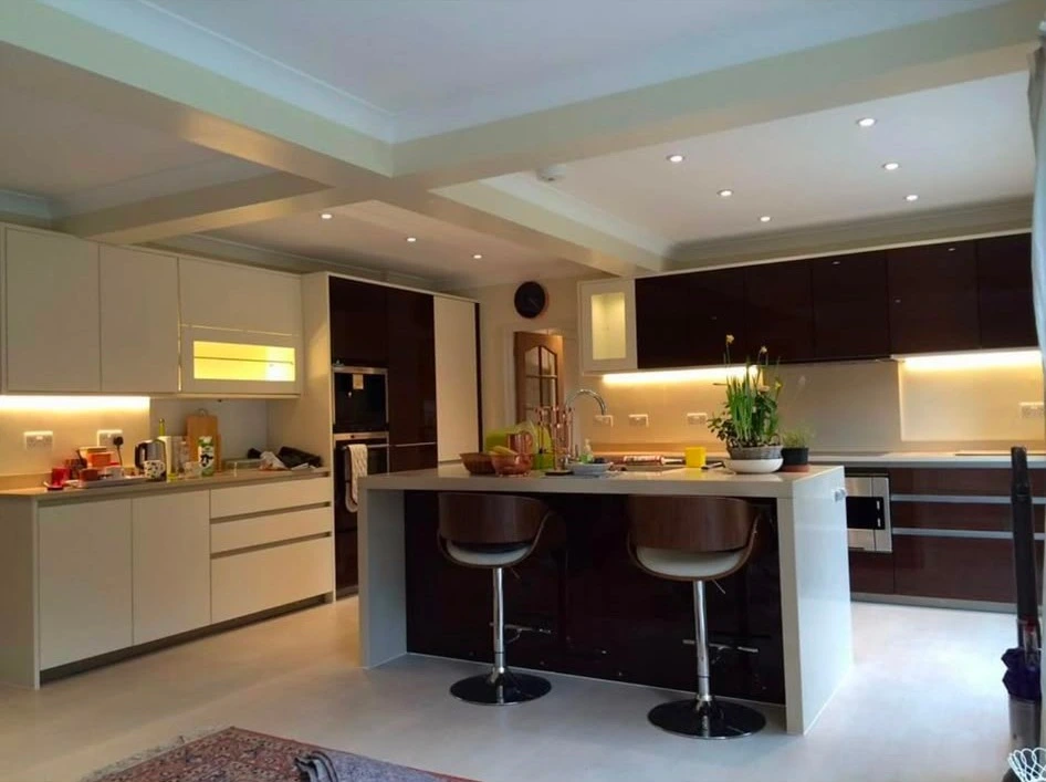 Kitchen downlights and under-cabinet lighting switched on