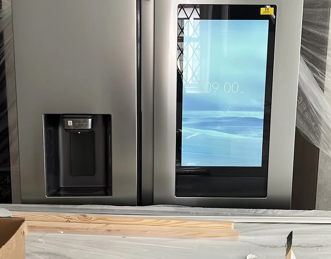 Smart fridge freezer powered up during a kitchen refurbishment